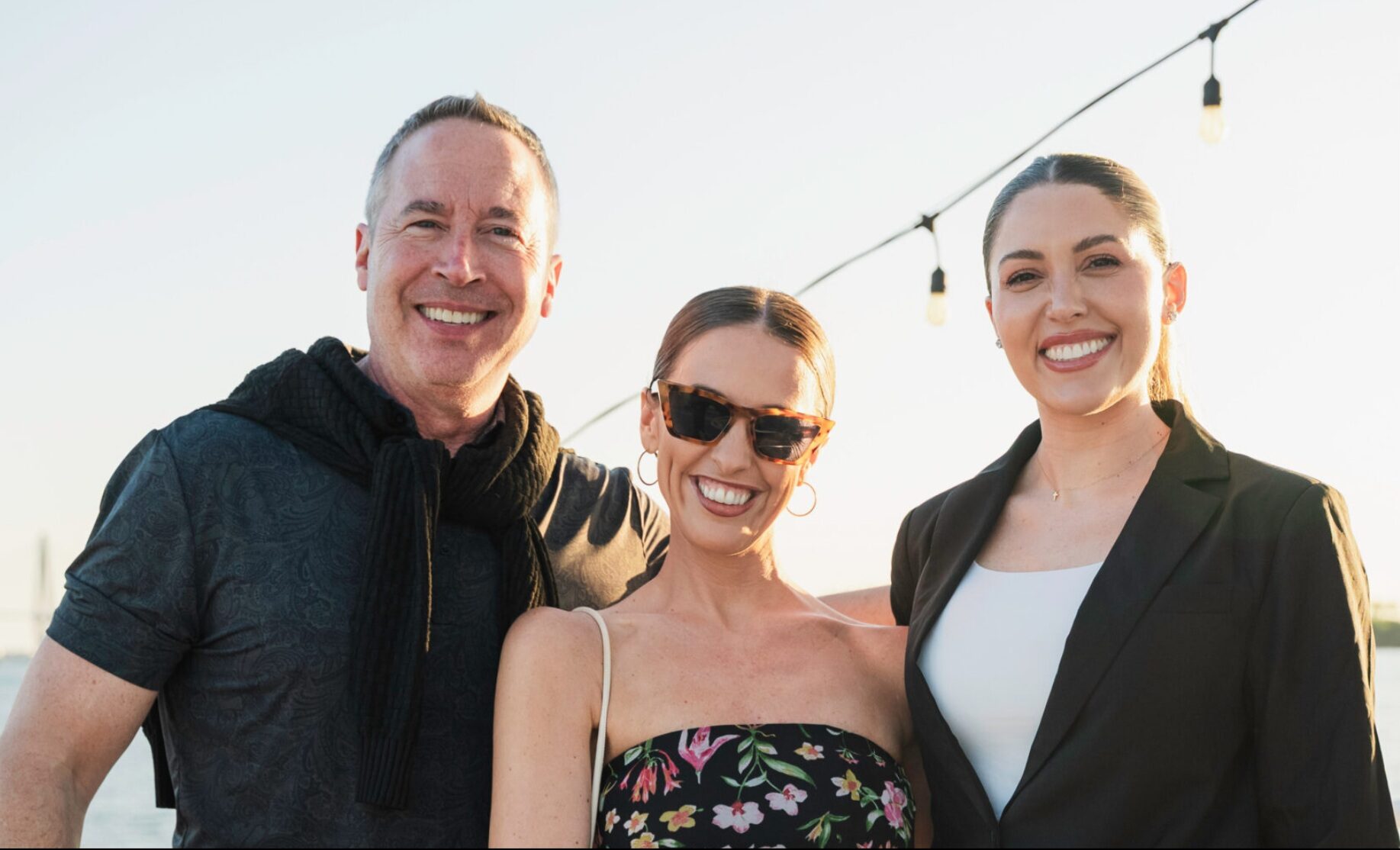 Lance Graulich with guests at an evening industry event